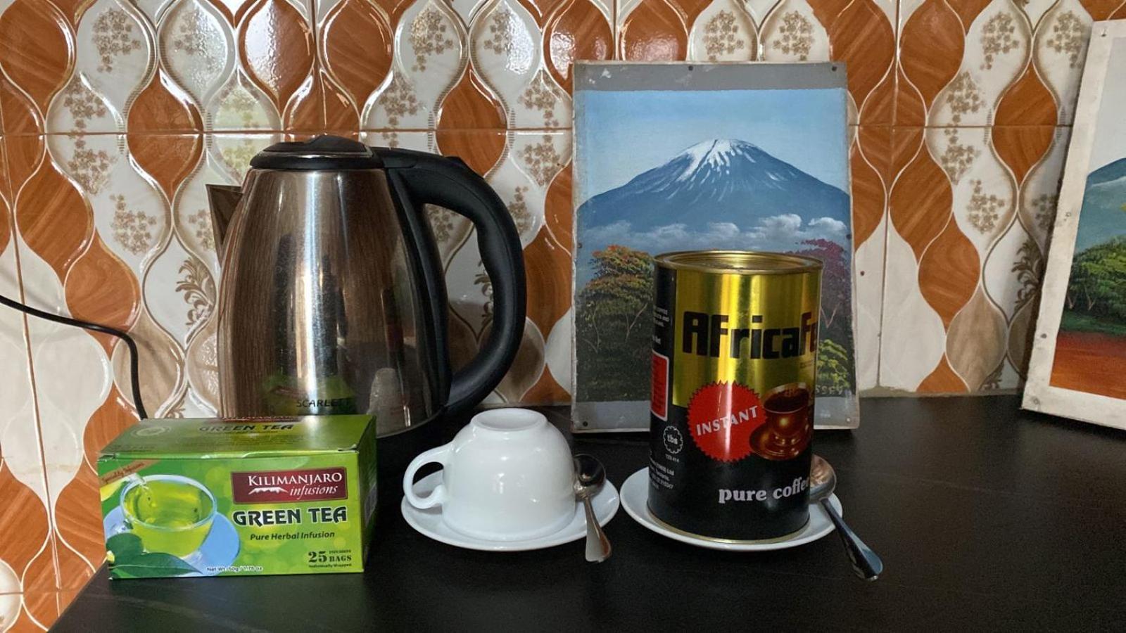 Home Feeling Kilimanjaro Moshi Bagian luar foto