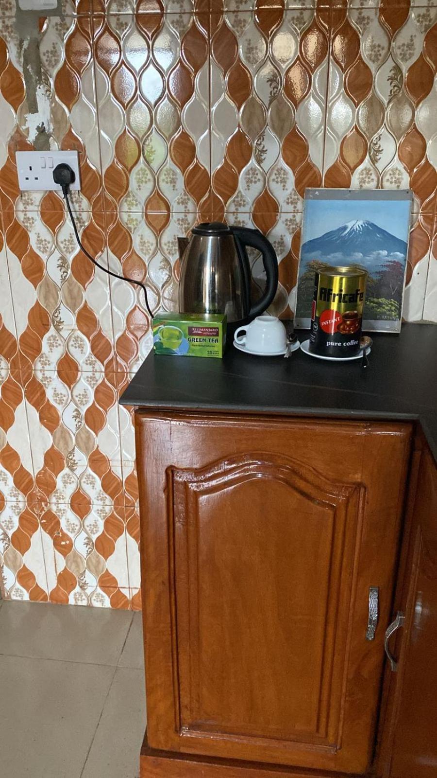 Home Feeling Kilimanjaro Moshi Bagian luar foto